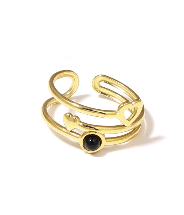 Anillo dorado con corazones y piedra