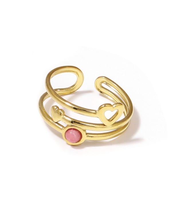 Anillo dorado con corazones y piedra