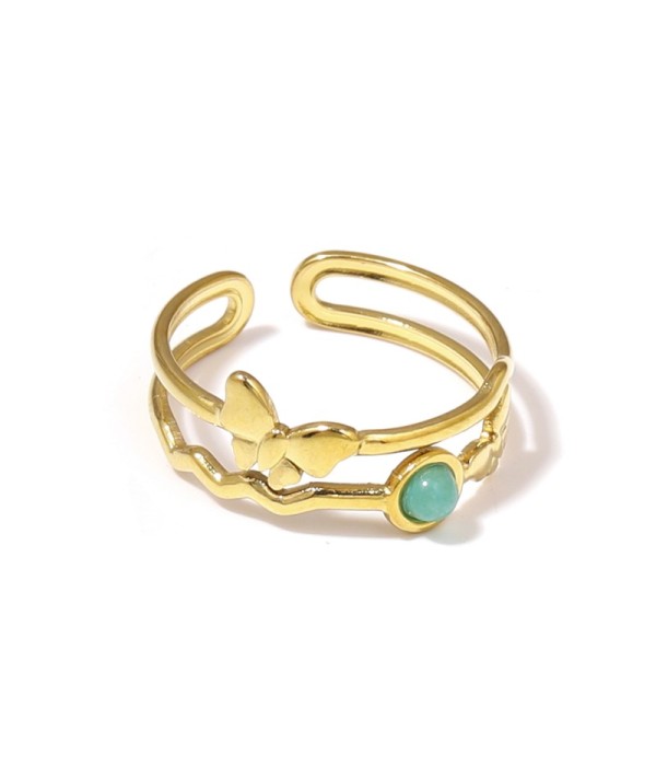Anillo dorado con mariposa y piedra