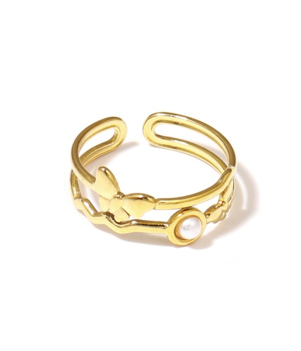 Anillo dorado con mariposa y piedra
