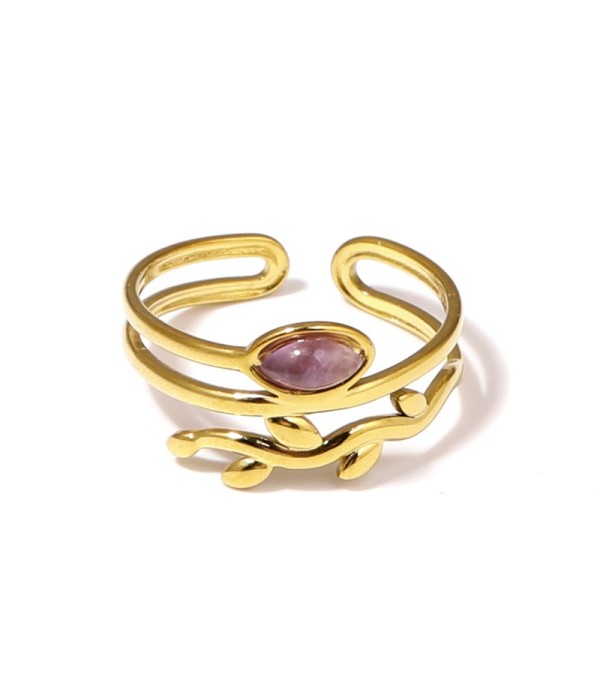 Anillo dorado con diseño de hojas y piedra