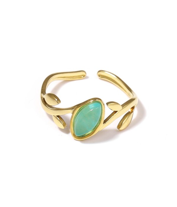 Anillo dorado con diseño de hojas y piedra rosa