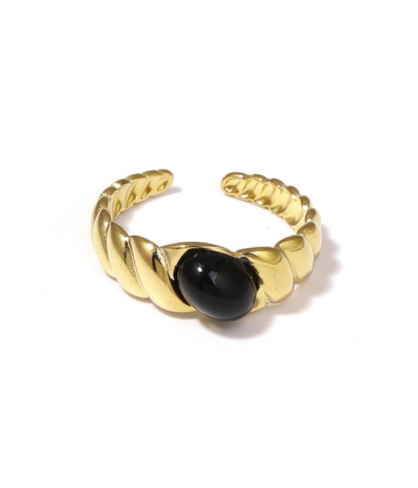 Anillo dorado abierto con piedra ovalada