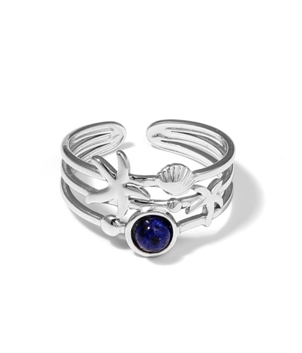 Anillo plateado con estrella de mar, concha y piedra
