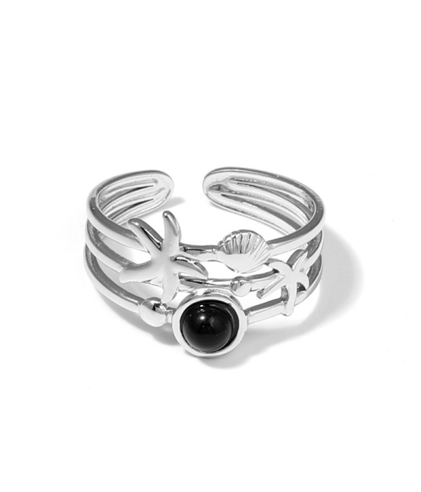 Anillo plateado con estrella de mar, concha y piedra