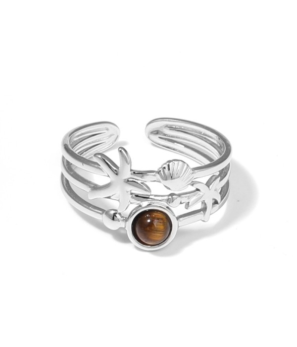 Anillo plateado con estrella de mar, concha y piedra
