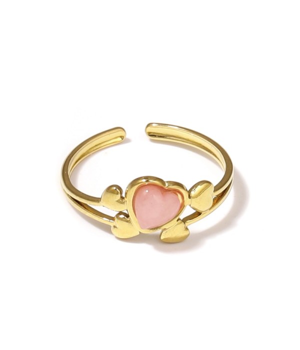 Anillo dorado con corazones y piedra