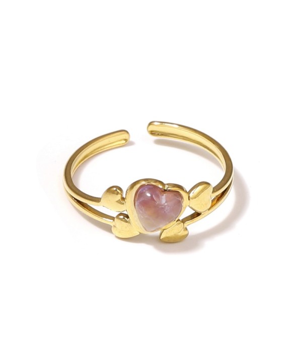 Anillo dorado con corazones y piedra