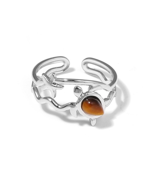 Anillo plateado con motivos marinos y piedra