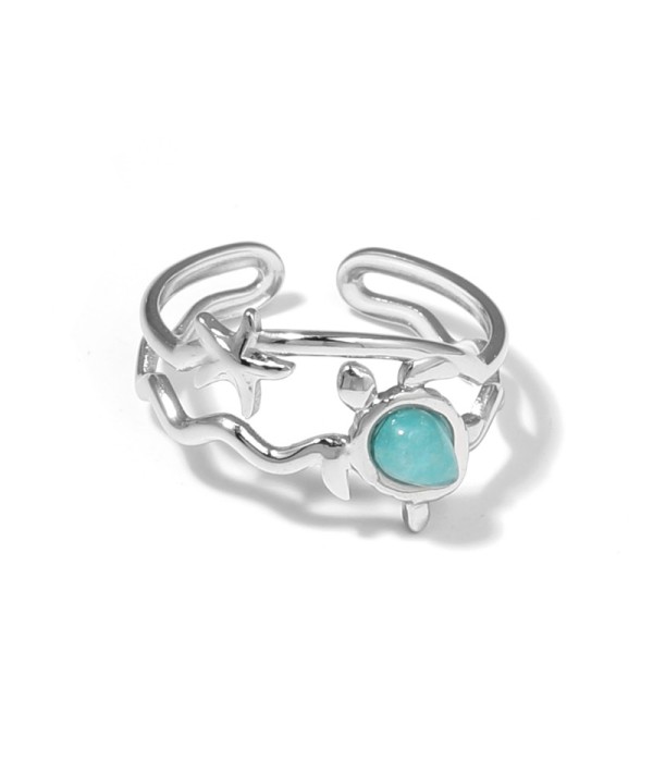Anillo plateado con motivos marinos y piedra