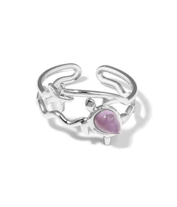 Anillo plateado con motivos marinos y piedra