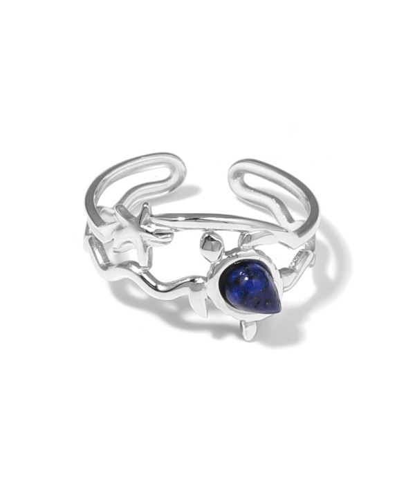 Anillo plateado con motivos marinos y piedra