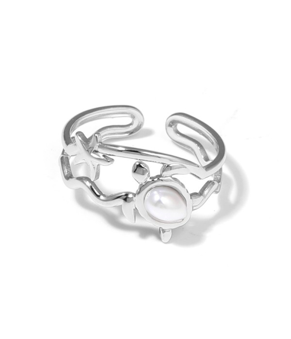 Anillo plateado con motivos marinos y piedra