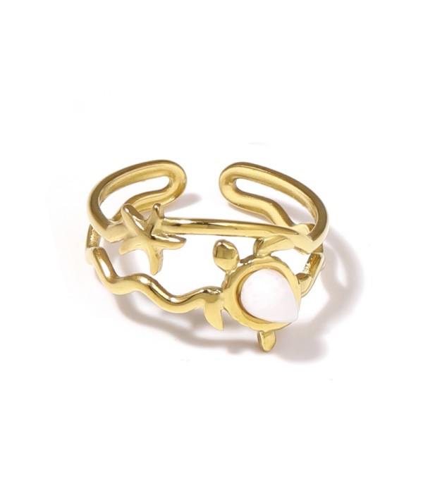 Anillo dorado con motivos marinos y piedra