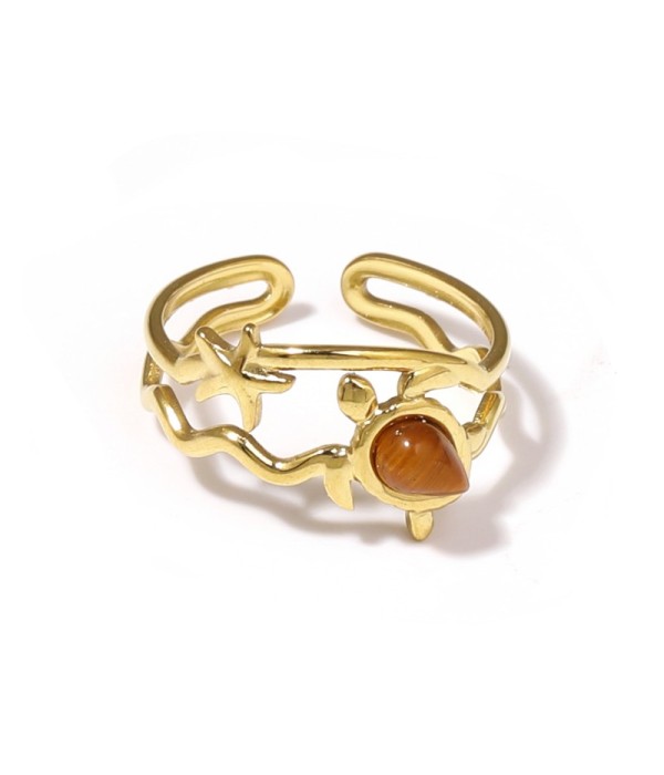 Anillo dorado con motivos marinos y piedra