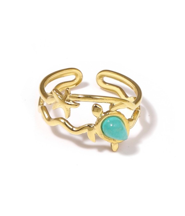 Anillo dorado con motivos marinos y piedra