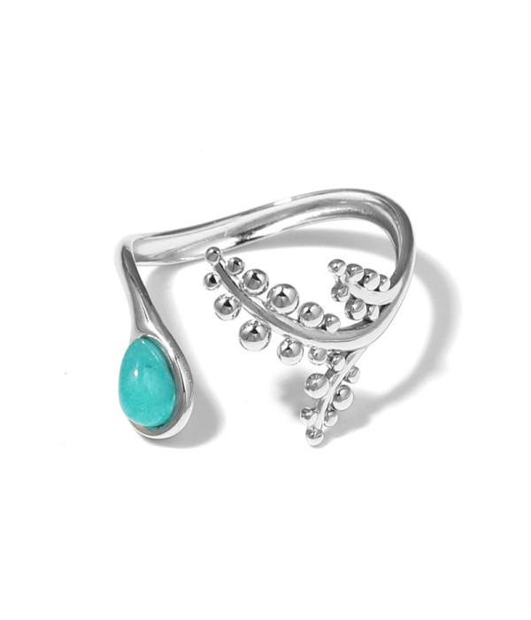 Anillo plateado con detalles botánicos y piedra