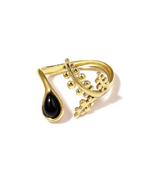 Anillo dorado con detalles botánicos y piedra