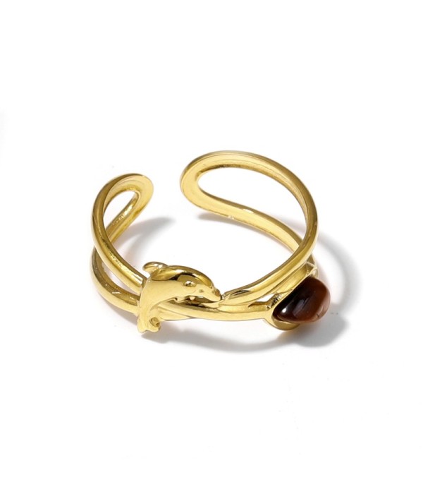 Anillo dorado con diseño de delfín y piedra