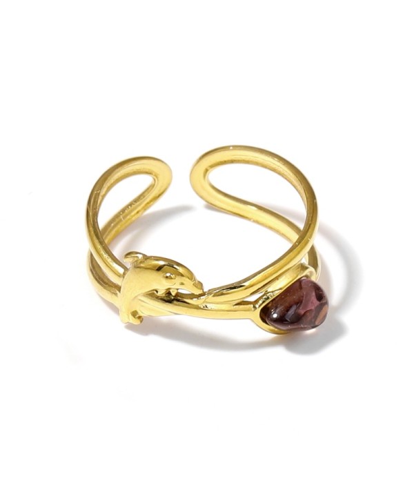 Anillo dorado con diseño de delfín y piedra