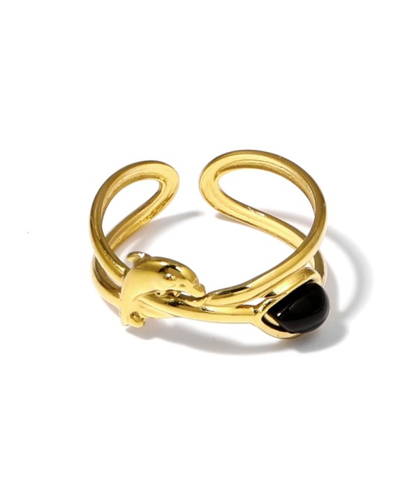Anillo dorado con diseño de delfín y piedra