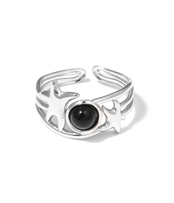 Anillo plateado con estrellas de mar y piedra