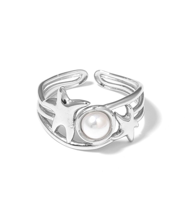 Anillo plateado con estrellas de mar y piedra