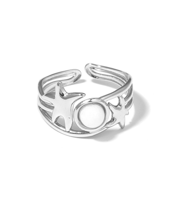 Anillo plateado con estrellas de mar y piedra