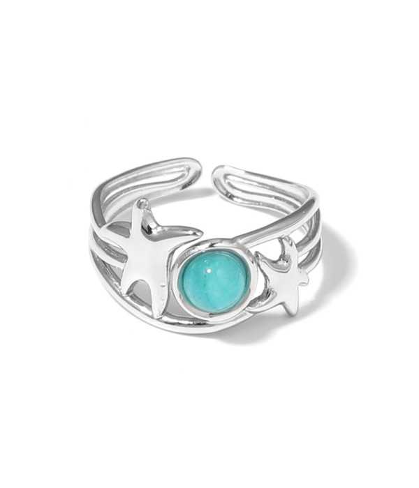 Anillo plateado con estrellas de mar y piedra