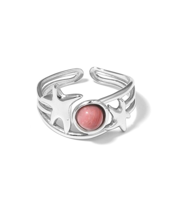 Anillo plateado con estrellas de mar y piedra