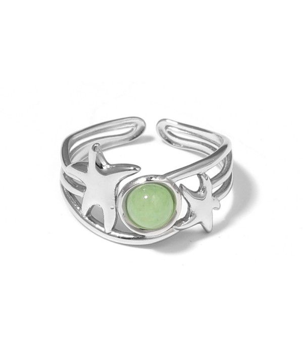 Anillo plateado con estrellas de mar y piedra