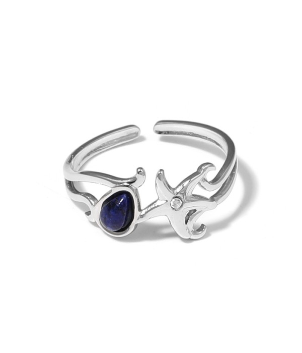 Anillo plateado con estrella de mar y piedra