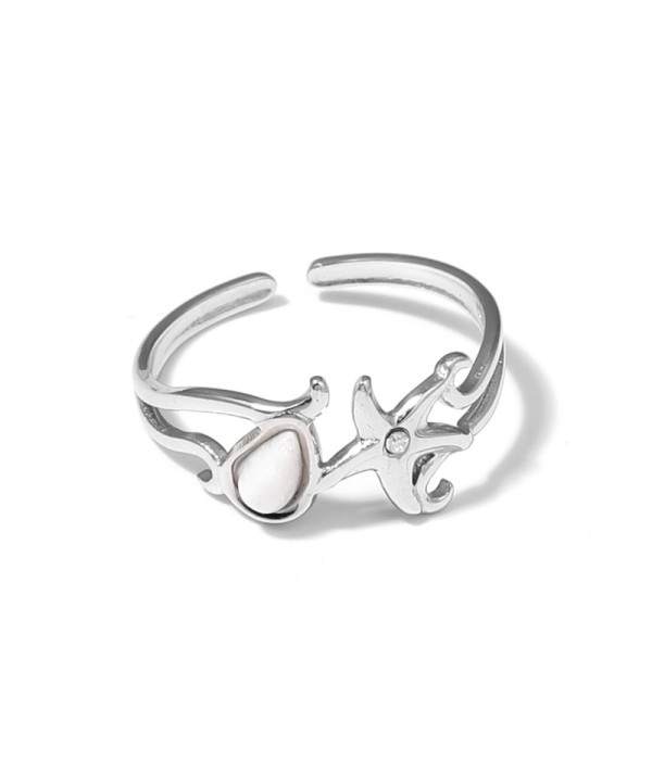 Anillo plateado con estrella de mar y piedra