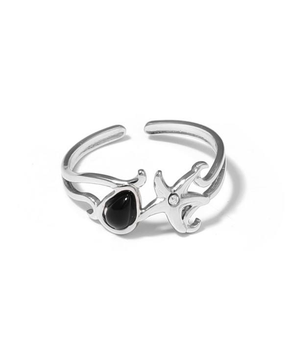 Anillo plateado con estrella de mar y piedra