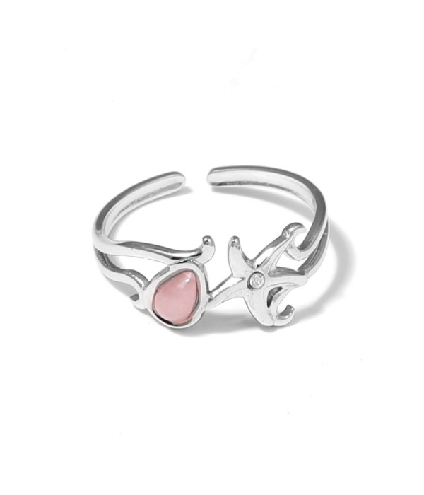 Anillo plateado con estrella de mar y piedra