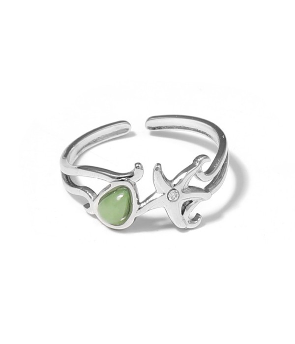 Anillo plateado con estrella de mar y piedra