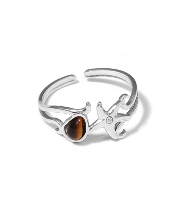 Anillo plateado con estrella de mar y piedra