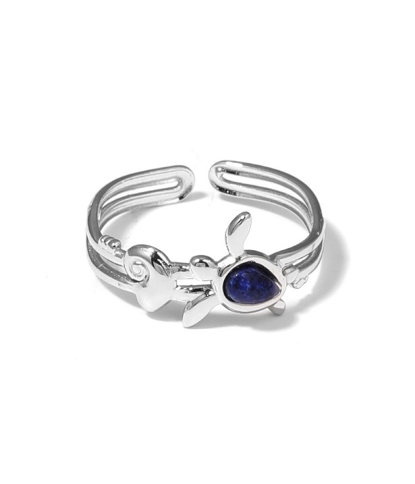 Anillo plateado con motivos marinos y piedra