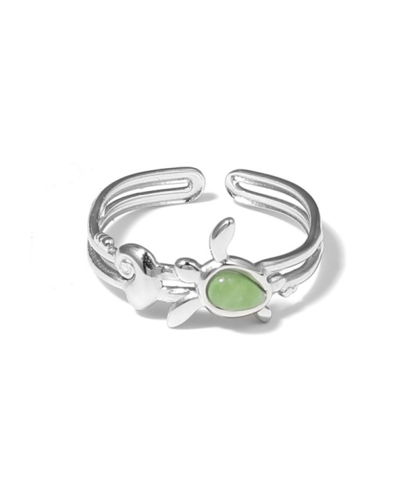 Anillo plateado con motivos marinos y piedra