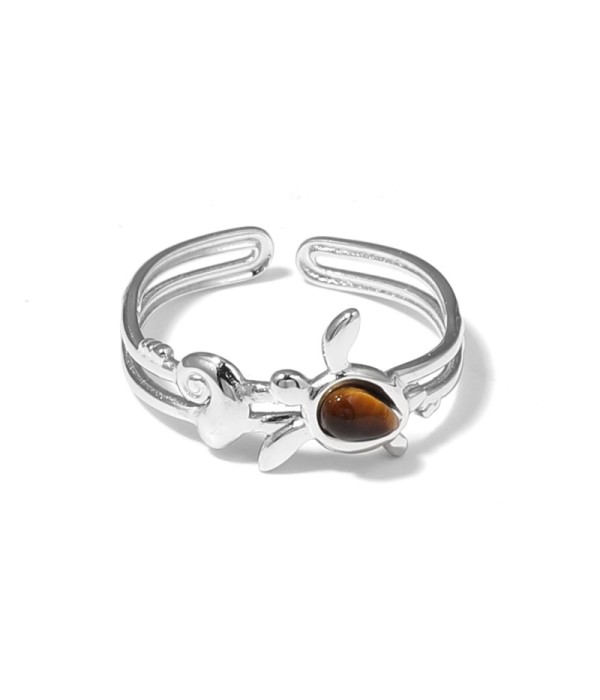 Anillo plateado con motivos marinos y piedra