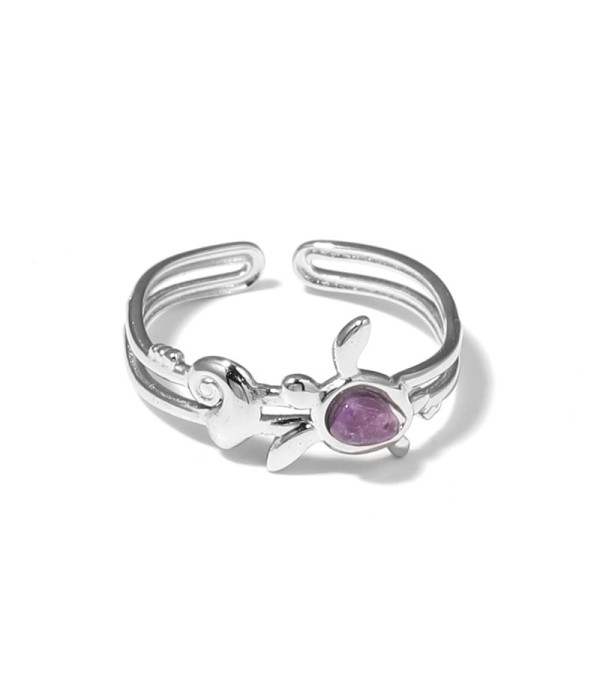 Anillo plateado con motivos marinos y piedra