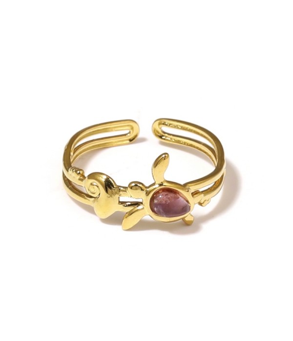 Anillo dorado con motivos marinos y piedra