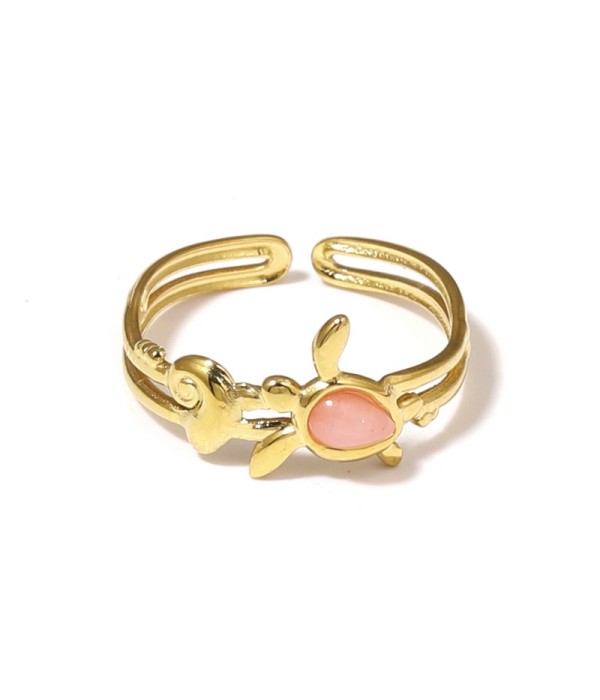 Anillo dorado con motivos marinos y piedra