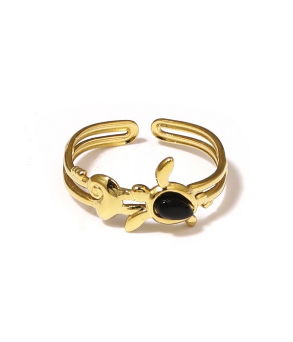 Anillo dorado con motivos marinos y piedra