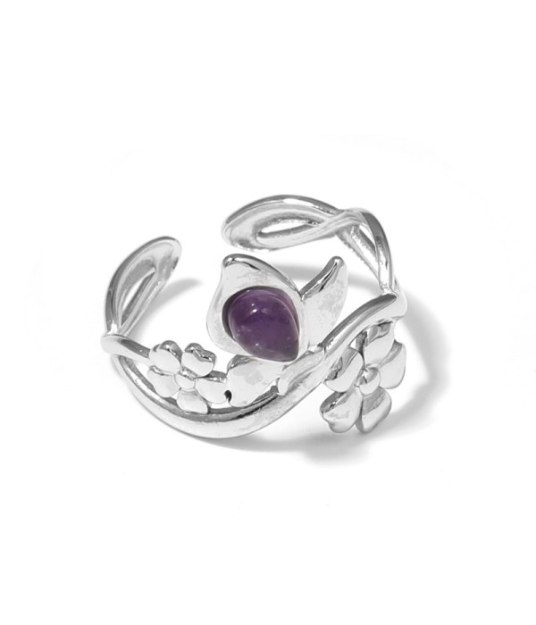 Anillo plateado con motivos flores y piedra