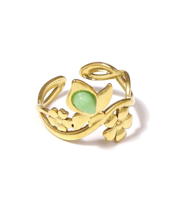 Anillo dorado con motivos flores y piedra