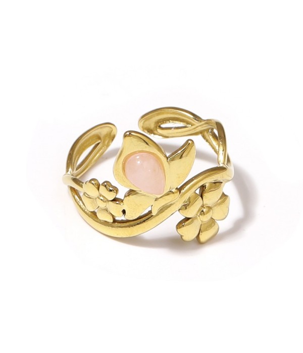 Anillo dorado con motivos flores y piedra