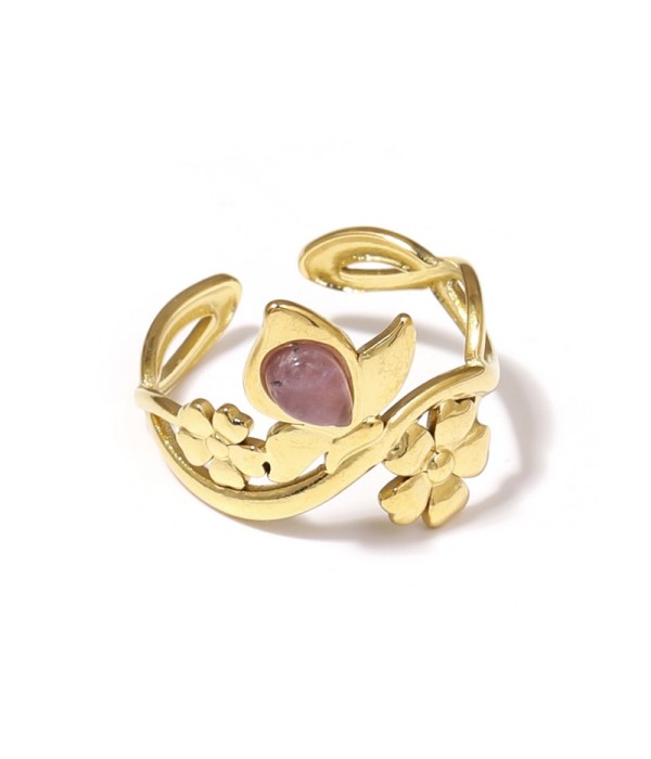 Anillo dorado con motivos flores y piedra