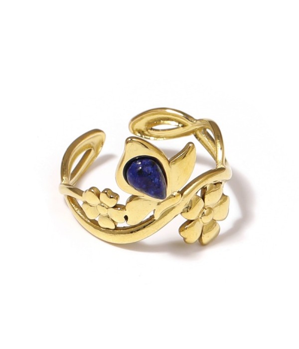 Anillo dorado con motivos flores y piedra