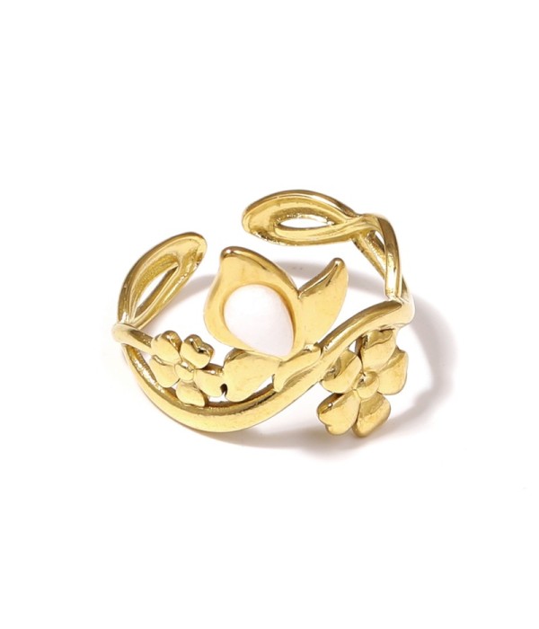 Anillo dorado con motivos flores y piedra